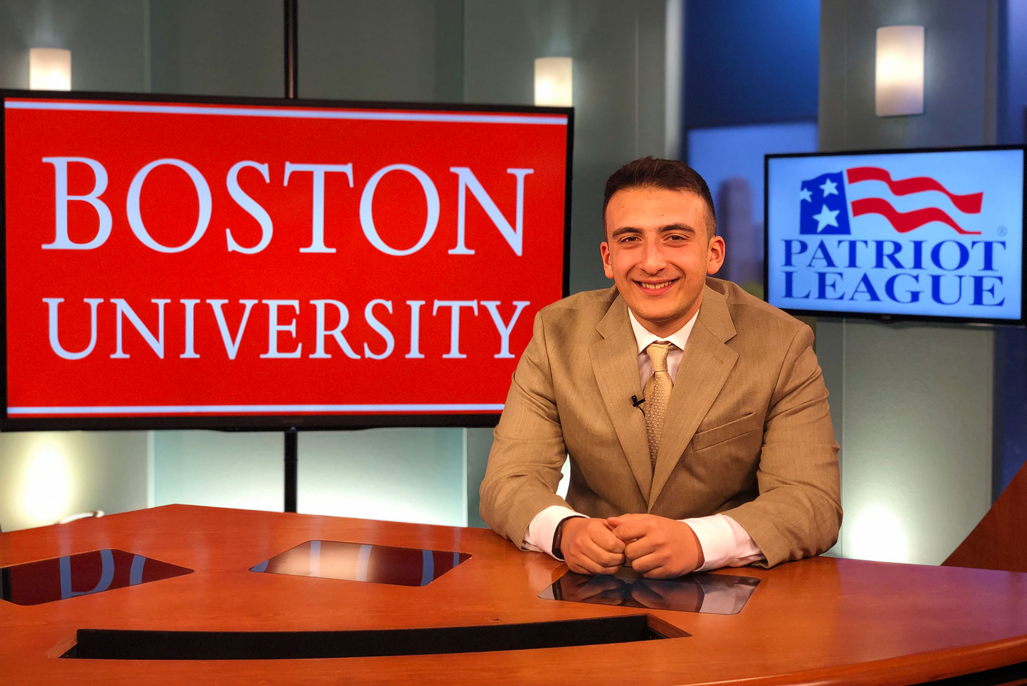 A photo of Greg Levinsky at a news desk