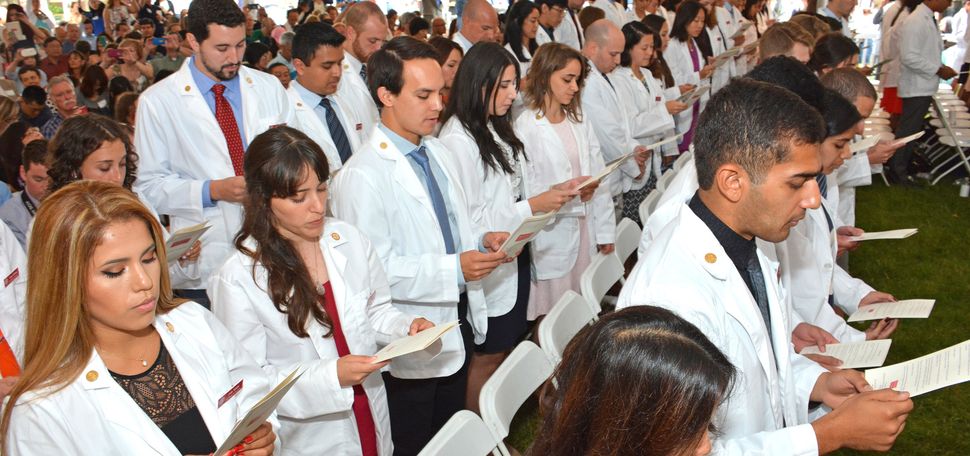 A photo of the 2016 Boston University white coat ceremony