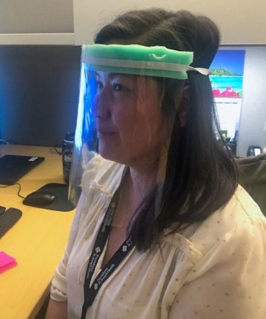 A photo of a healthcare worker wearing a facemask assembled by Ravi Patel