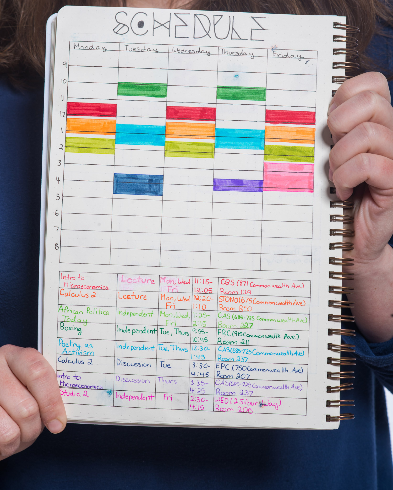 A photo of a bullet journal turned to a page reading "Schedule"