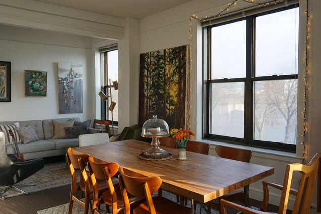 Photo of the kitchen in Kinh Vu’s apartment, where he normally hosts open hours for students, sits empty since COVID-19 cleared the campus. Sunlight pours in from the windows.