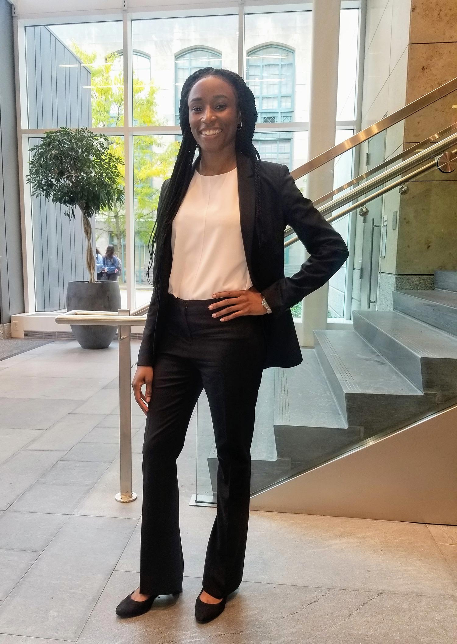 Portrait of Nadia Lee (LAW’20) in formal attire in front of a staircase; Lee helped draft the petition for emergency diploma privilege.