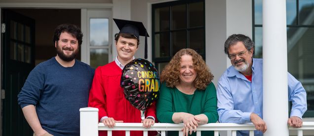 Jacob Gurvis (COM’20) with his family including brother Aaron, mom Laura, and dad Eric, in their Sherborn home May 17, 2020.