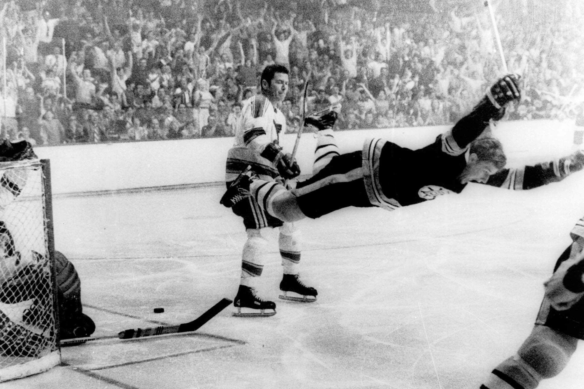A photo of Bobby Orr scoring the game-winning goal in the 1970 Stanley Cup Championship