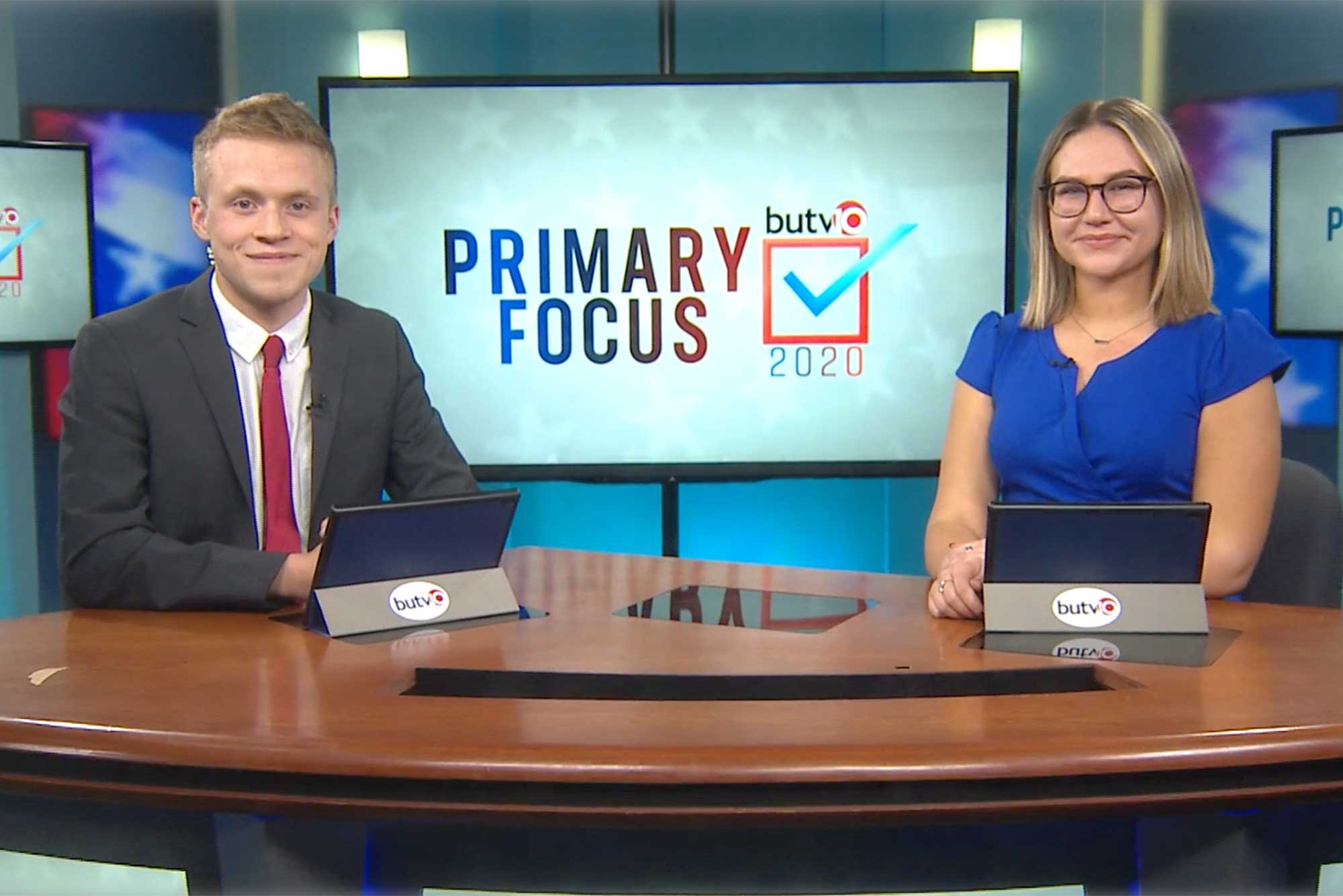 News anchors for BUTV10 show Primary Focus on the set.