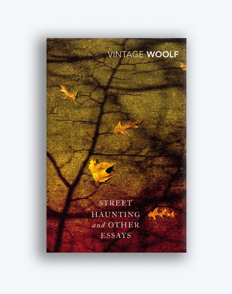 Cover for Virginia Woolf's "Street Haunting and Other Essays" with a dark photo of leaves on pavement and a shadow of a tree.