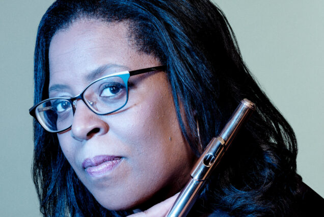 A portrait photo of Valerie Coleman with her flute