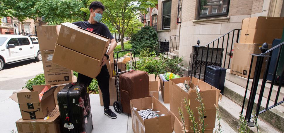 Jiaxin (Jack) Tong (COM’22) moves into his Bay State Rd residence on August 14. After his flights home to China got cancelled five times in the spring and early summer, Tong stayed on campus for the summer, taking classes.