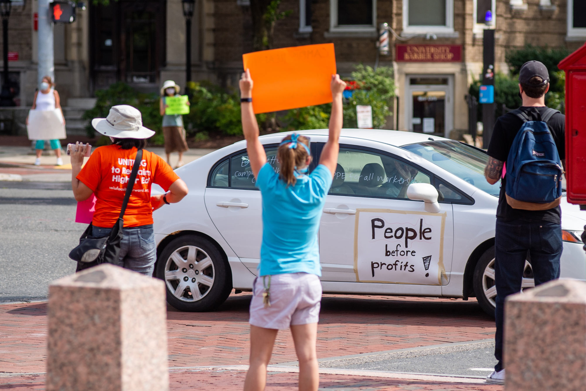 Photo of a protest against a return to in-person campus life on Marsh Plaza at Boston University