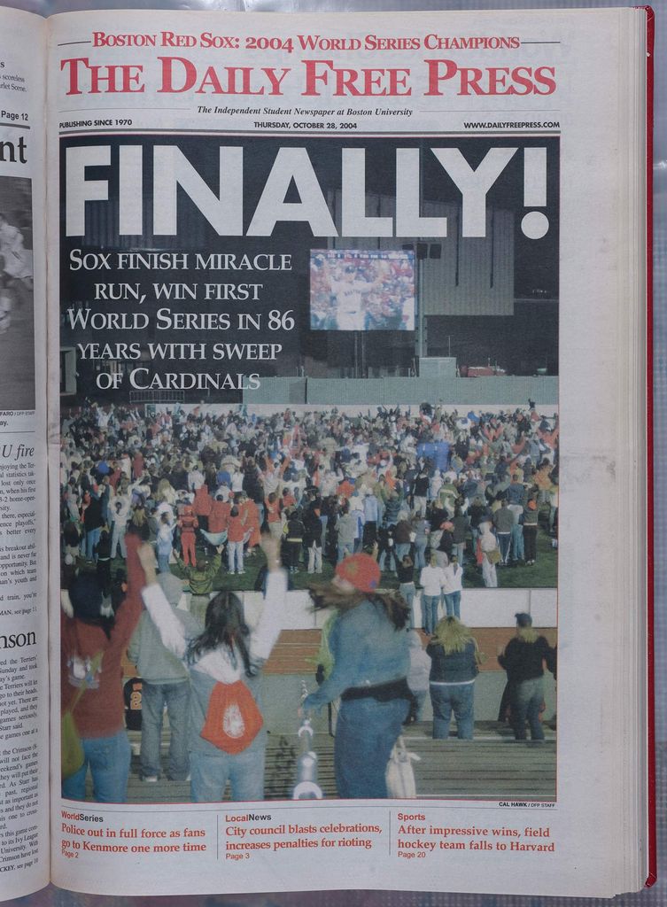 Front page of the Daily Free Press reads "Finally! Sox finish miracle run, with first World Series in 86 years with sweep of Cardinals" accompanied by a photo of students watching an outdoor screening of a Red Sox game.