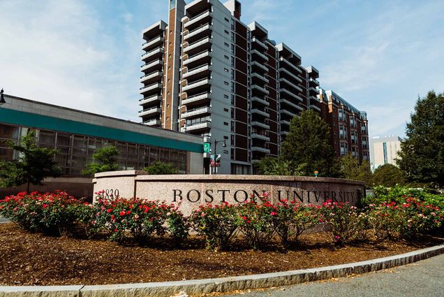 A photo of the Boston University sign at the top of Commonwealth Ave. as you enter campus from Kenmore Square