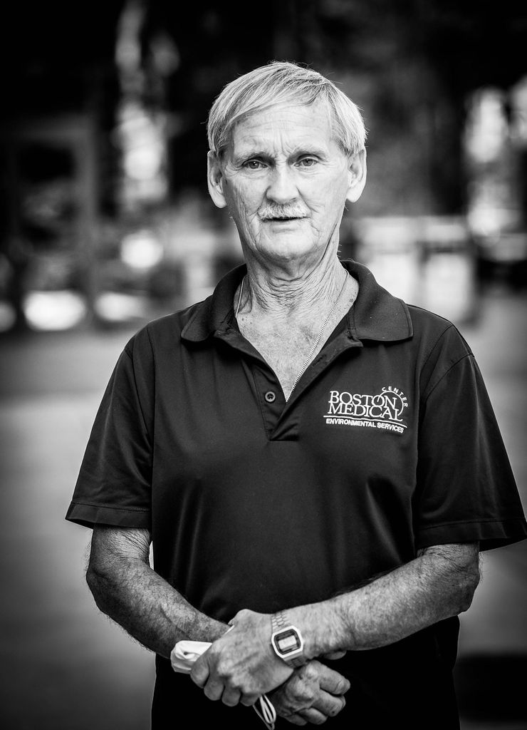 Black and white portrait of Tommy Loring, BMC environmental services, wearing. a polo shirt with the BMC logo.