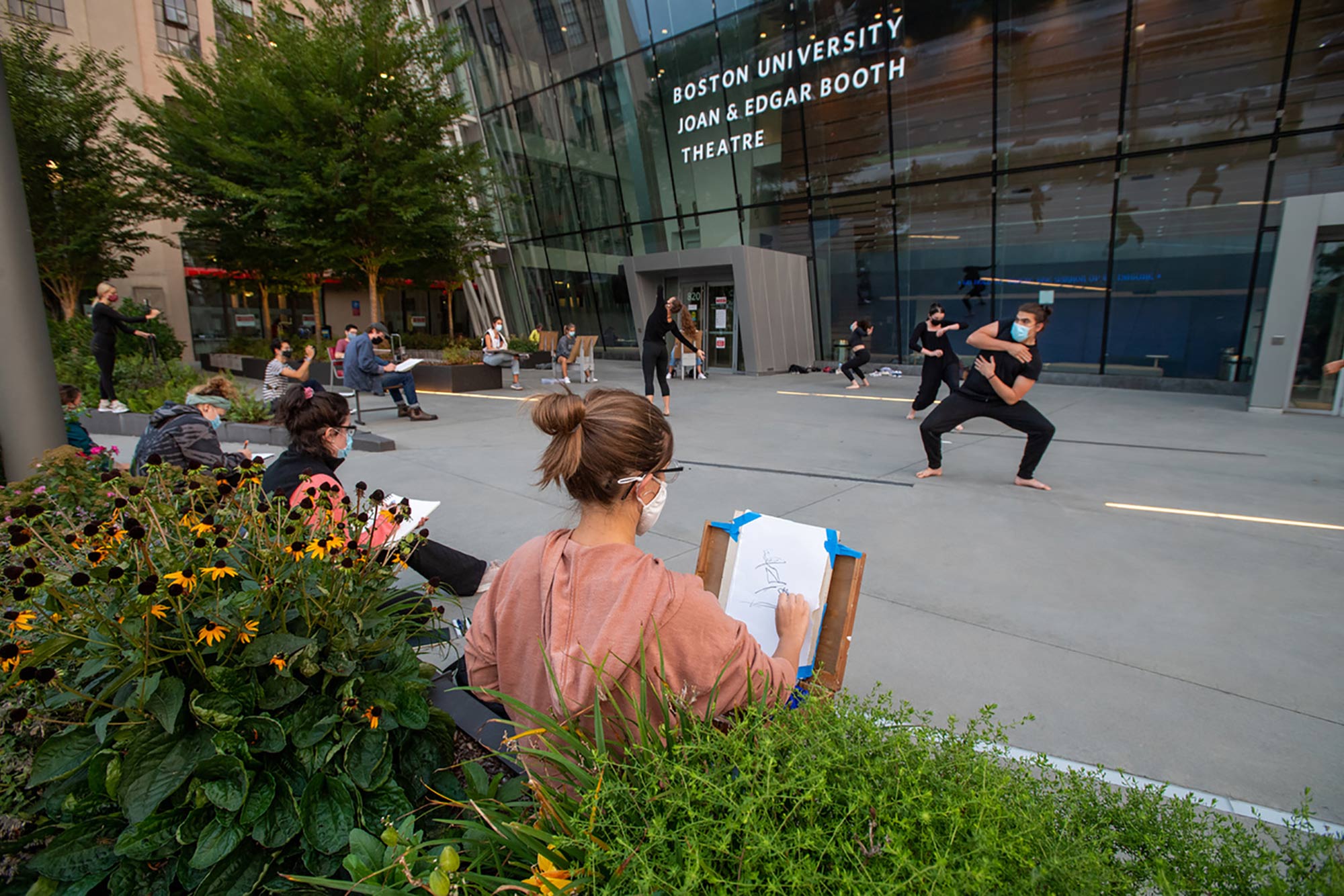 Photo taken alongside the Booth Theater, as Yo-EL Cassell's movement students from CFA make for the perfect models for Dana Clancy’s SVA students September 16. Students in masks are seen drawing the foreground.