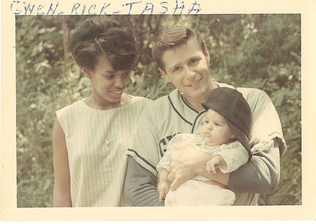 Photo of a faded printed photo of Trethewey, as an infant with her mother, Gwendolyn Ann Turnbough, and father Eric Trethewey, ca 1967. Photo courtesy Natasha Trethewey