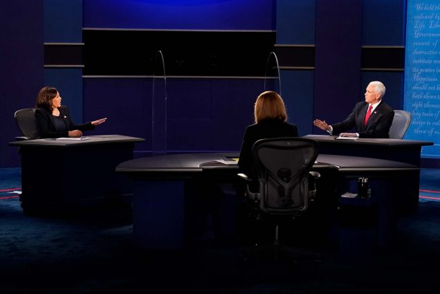 Senator Kamala Harris, Moderator Susan Page, Vice President Mike Pence on stage during the 2020 Vice Presidential Debate on October 7, 2020