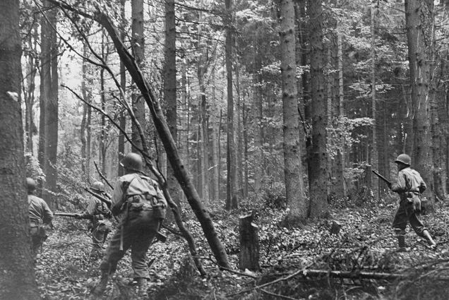 US infantrymen make their way through the Hürtgen Forest on November 8, 1944.
