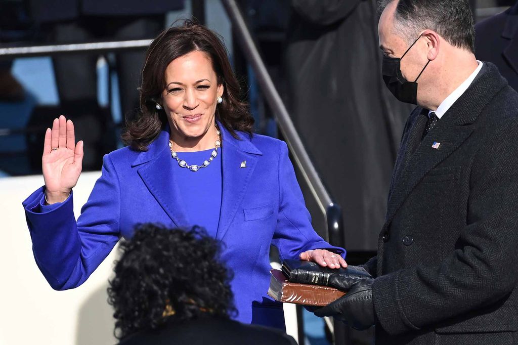 Kamala Harris is sworn in as vice president by Supreme Court Justice Sonia Sotomayor as her husband Doug Emhoff holds the Bible during the 59th Presidential Inauguration at the U.S. Capitol in Washington, Wednesday, Jan. 20, 2021. (Saul Loeb/Pool Photo via AP)