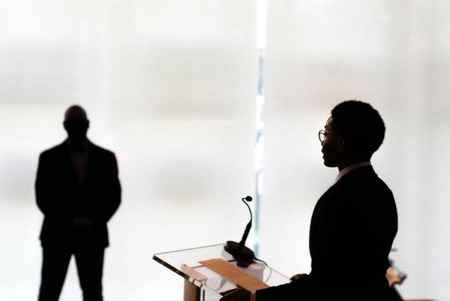 Chikezie Asuzu, Howard Thurman Center Ambassador speaks during the Martin Luther King, Jr. Day as Kenneth Elmore, Dean of Students and Associate Provost, looks on. The virtual celebration took place at the Howard Thurman Center.