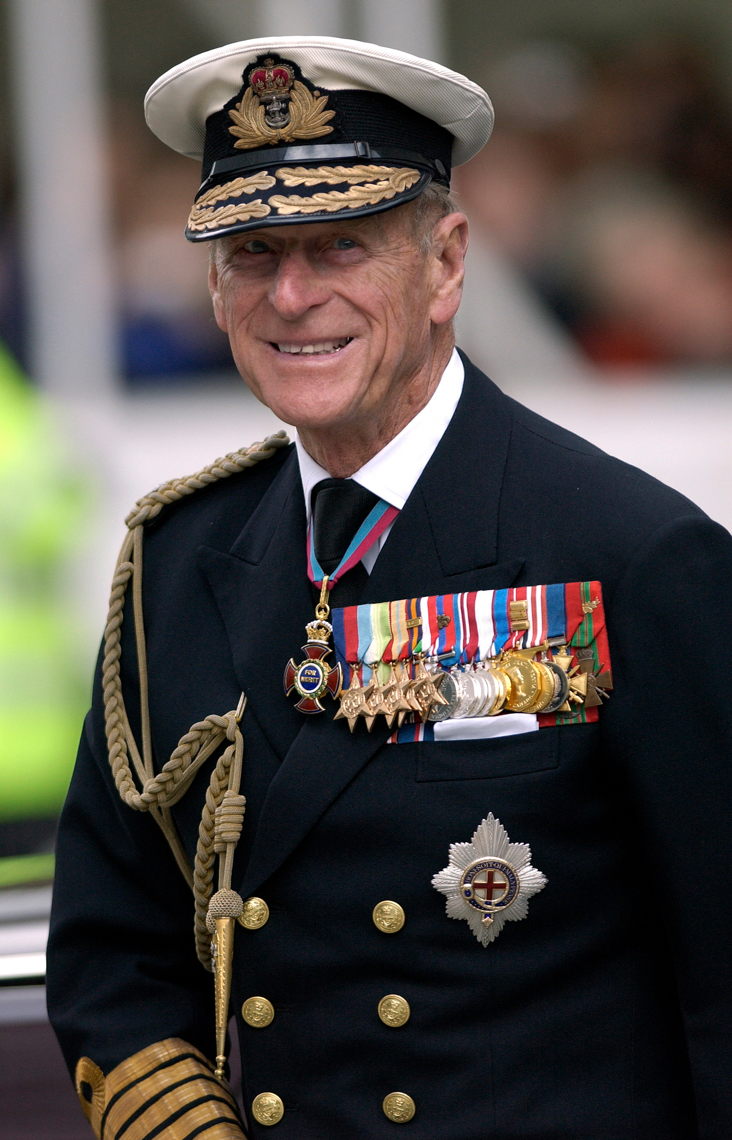 A photo of Prince Philip in dress uniform. He is smiling at the camera.