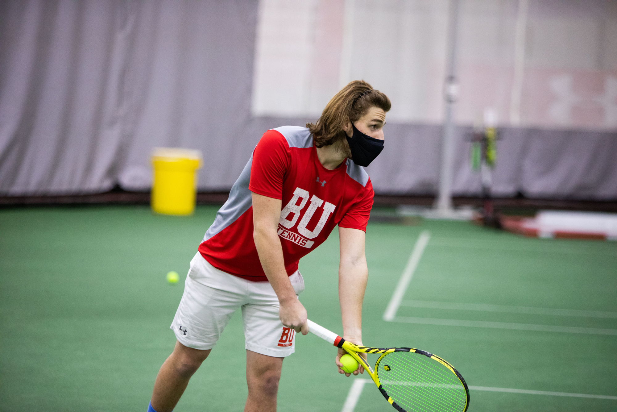 Pete Siozios prepares to serve the ball