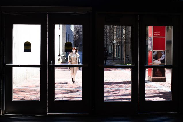 A photo of a student walking into an empty George Sherman Union