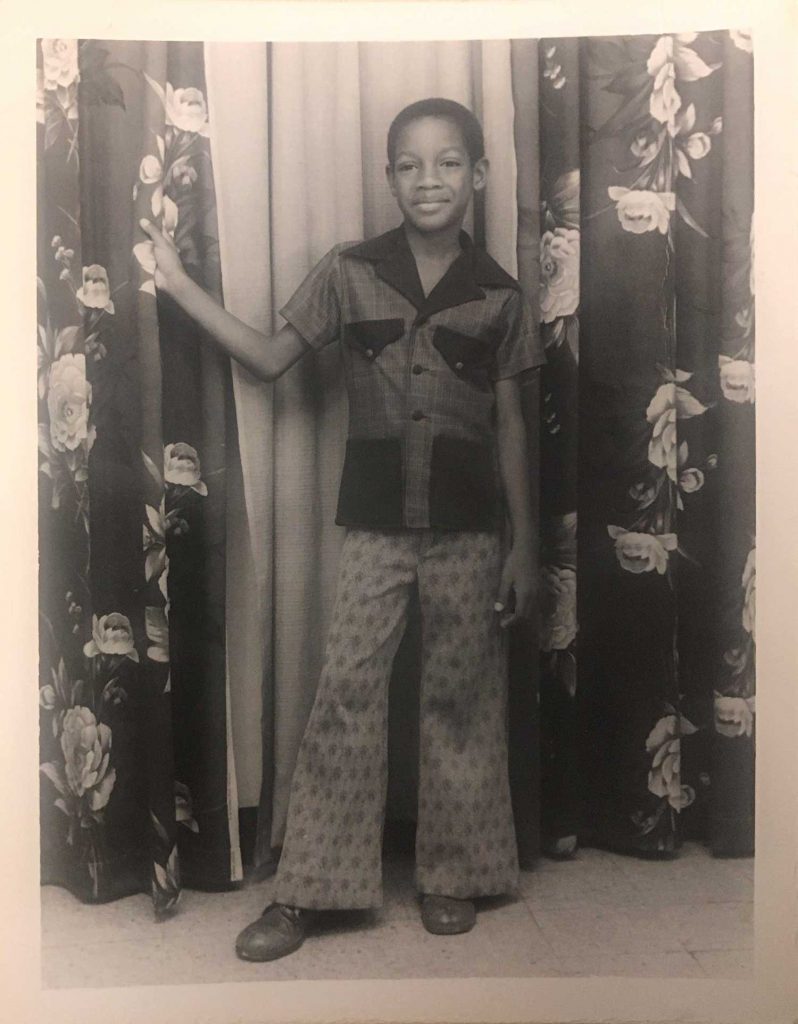 Childhood portrait of Louis Chude-Sokei wearing bellbottoms.