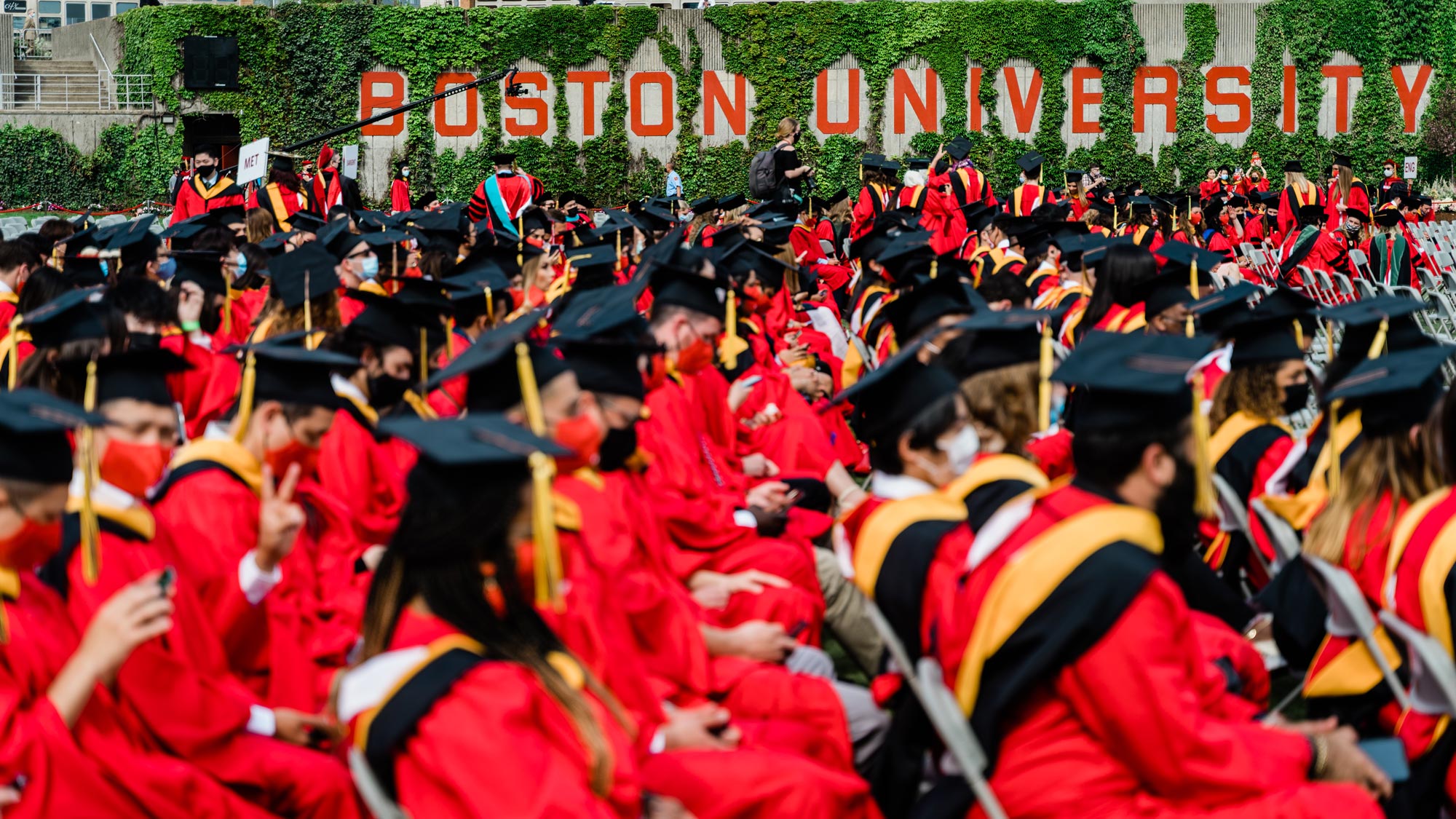 A photo of graduates seated on Nickerson Field for commencement