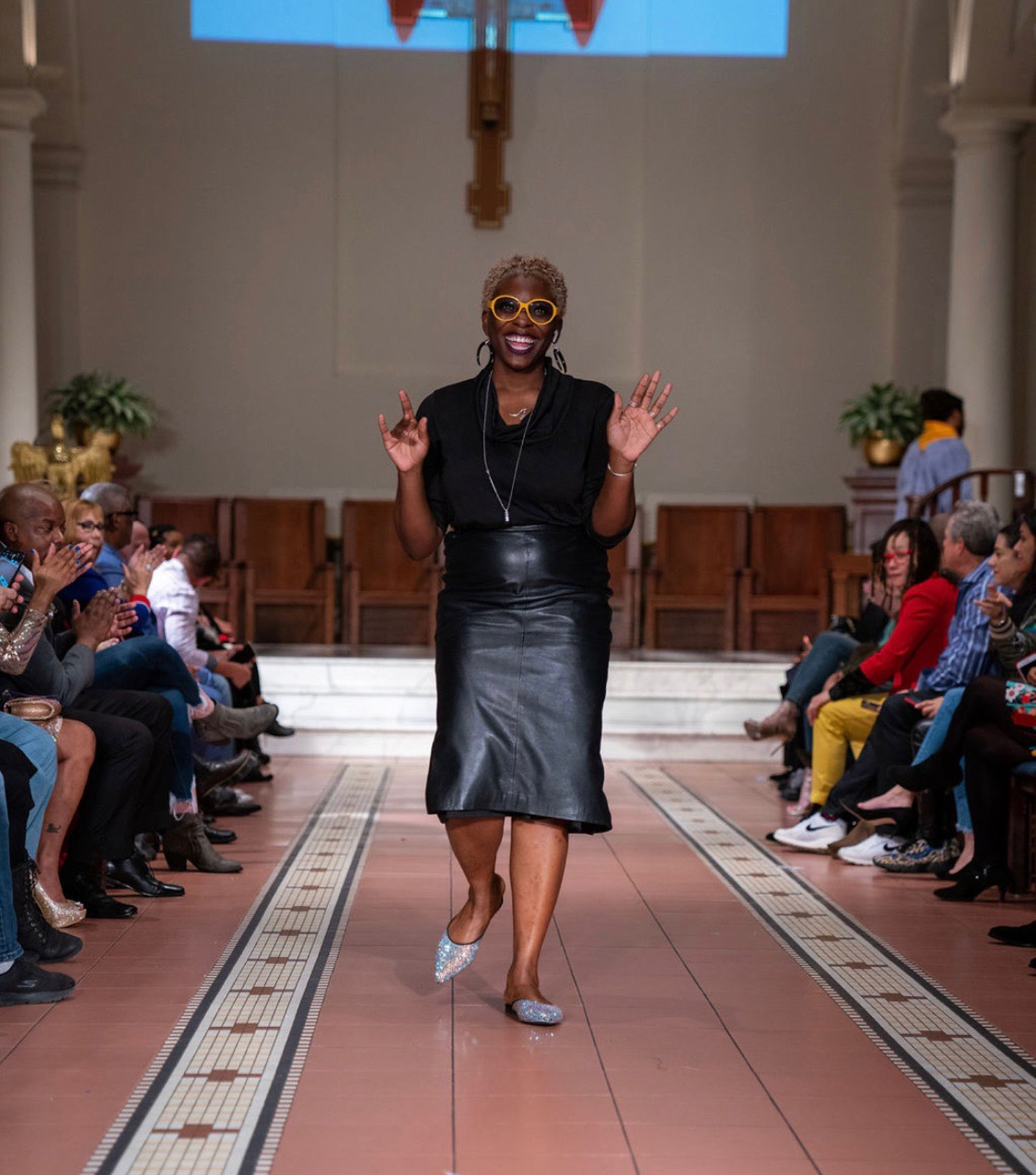 A photo of Abiola Agoro walking down the runway