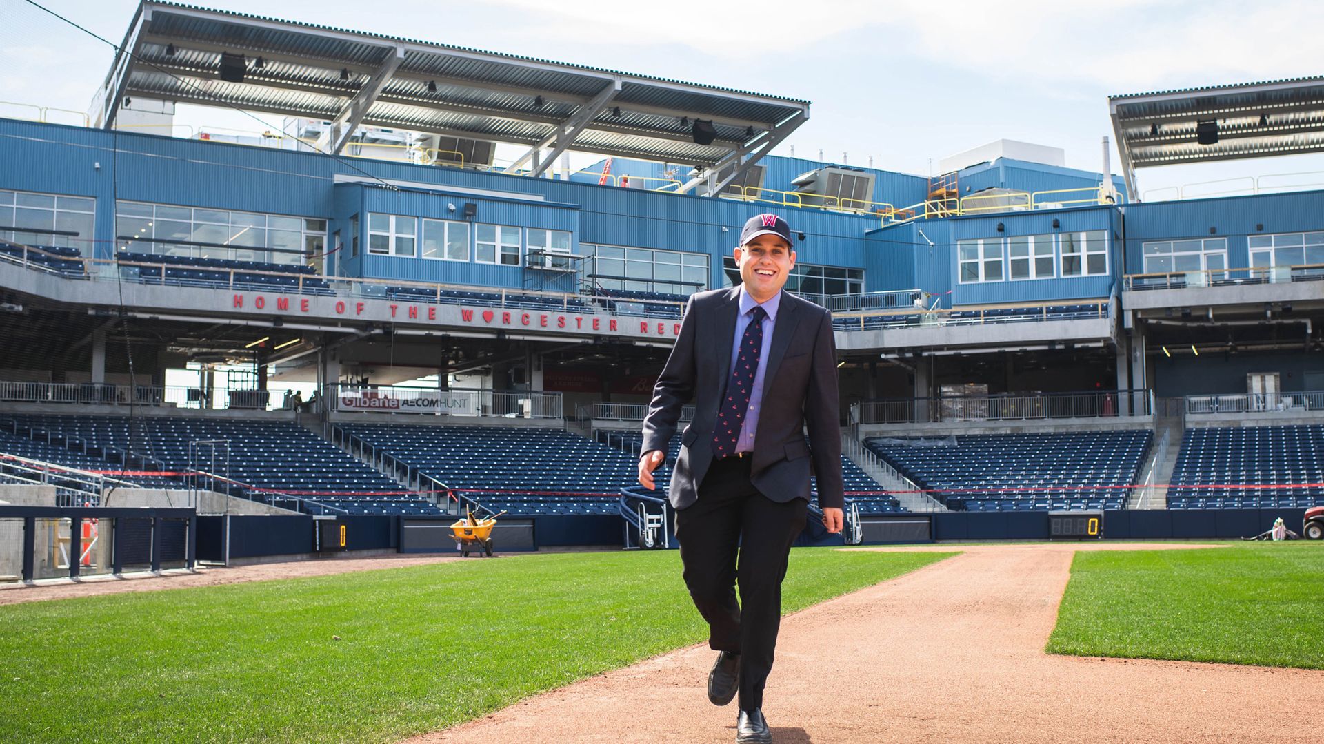 A photo of Matt Levin walking around the basepath of Polar Park.