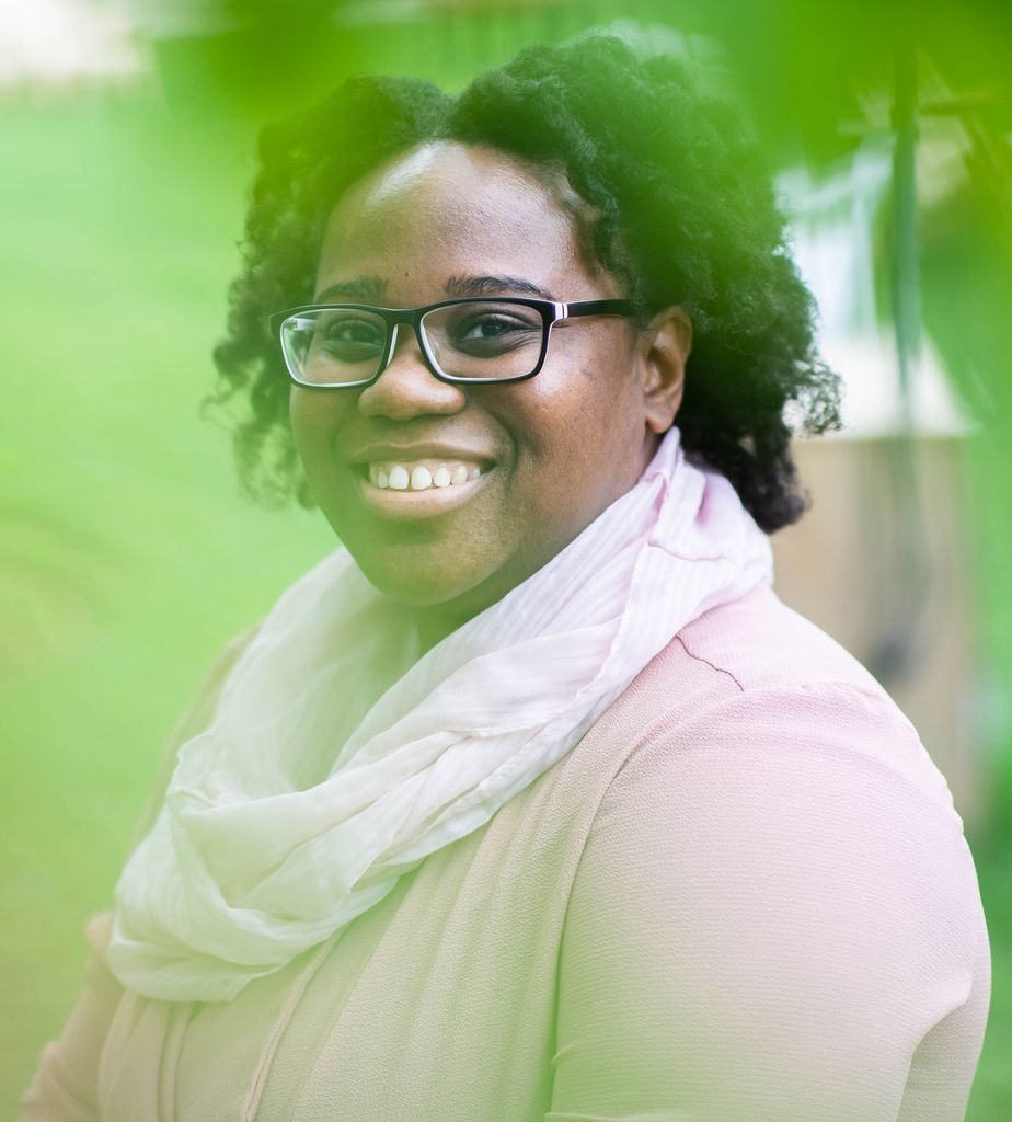 A portrait photo of Sara Horatius smiling at the camera