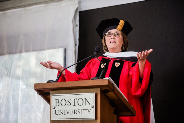 Catherine D’Amato addressing graduates from a podium