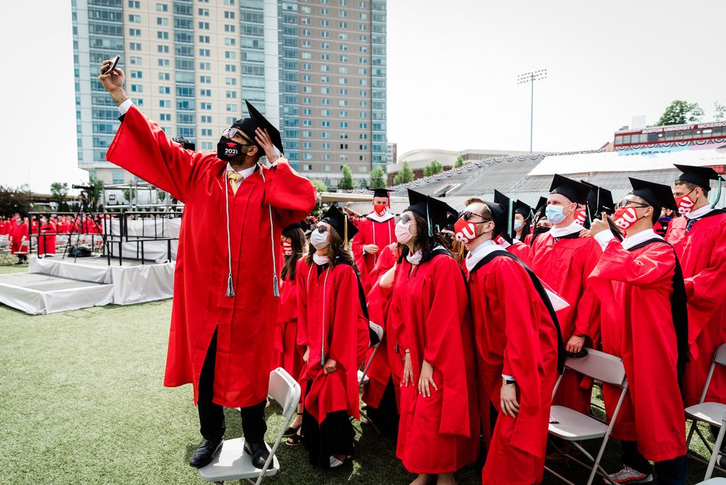 A photo of a group of students taking a selfie on Nickerson Field