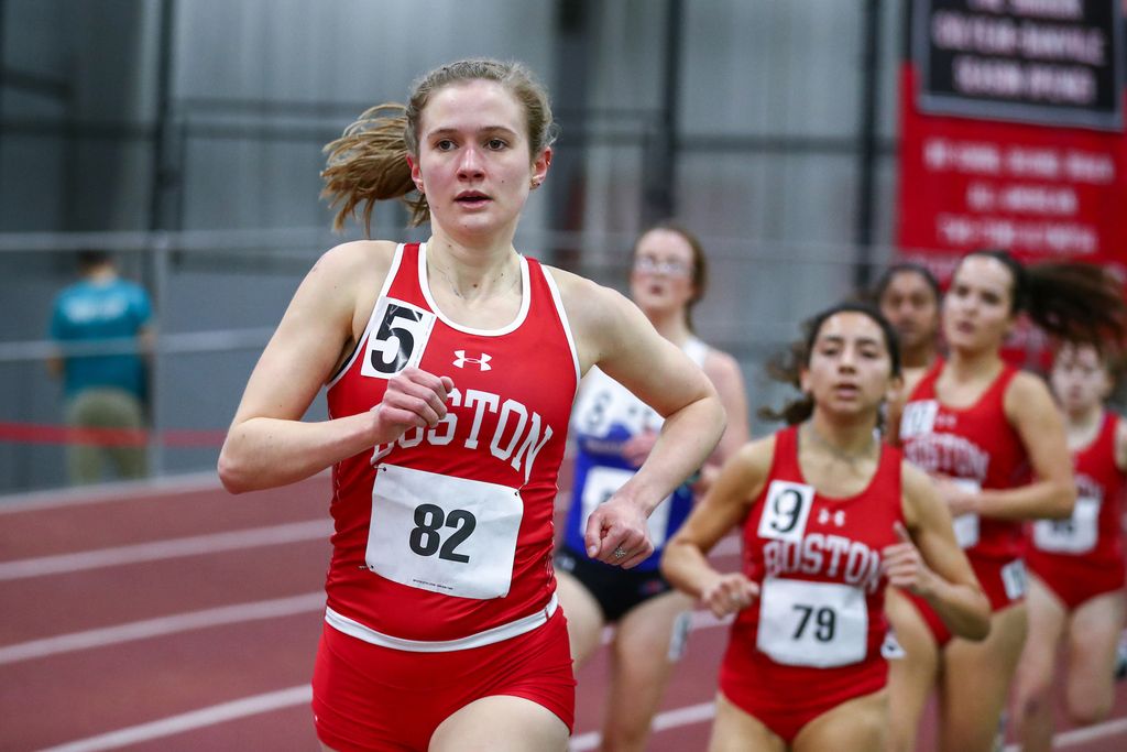 A photo of Veronica Kriss running on a track