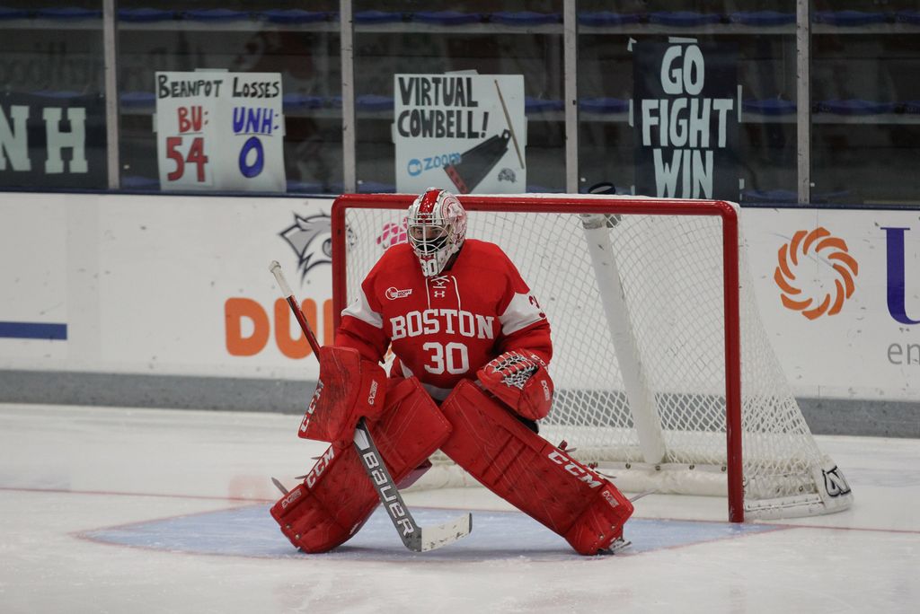 A photo of Corinne Schroeder in goal on the ice