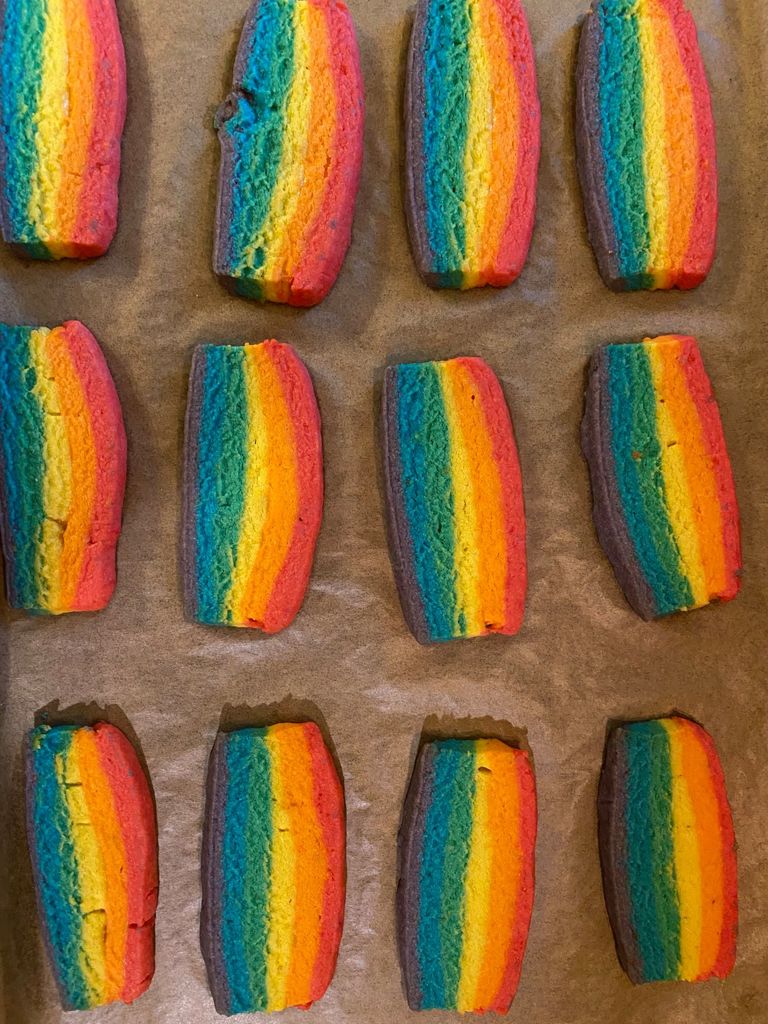 Fresh baked rainbow flag cookies baked by Virginia Sapiro.