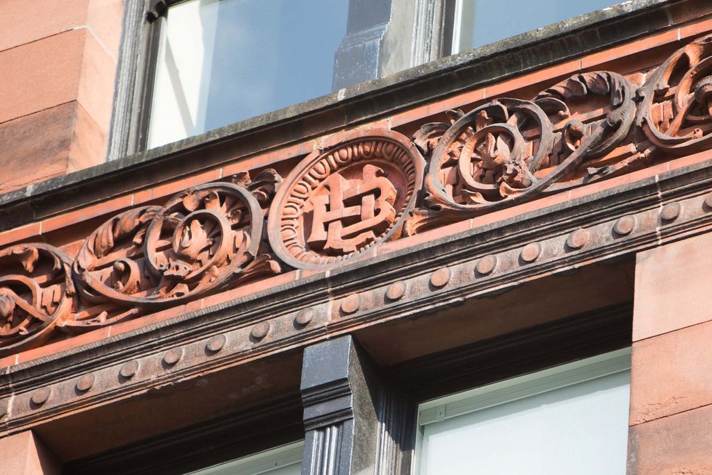 BU seal inlaid in the Claflin Building's stonework.