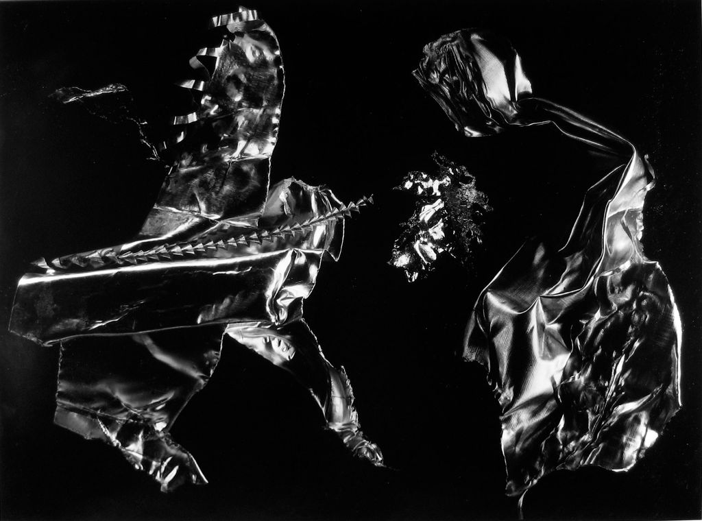 Abstract photograph in black and white. The objects in the photograph resemble scrap metal.