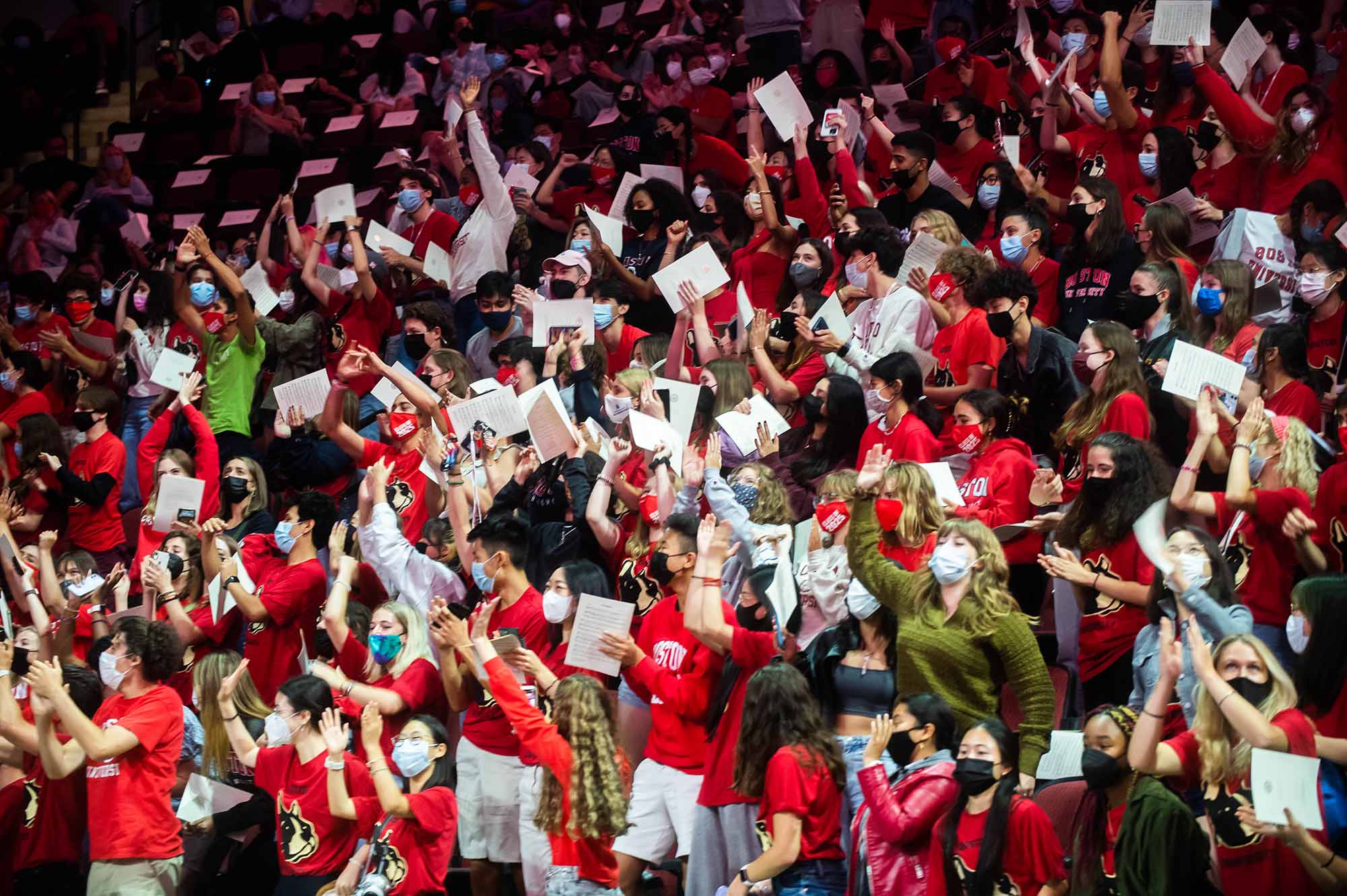 Members of the Boston University Class of 2025 react during the Matriculation ceremony at Agganis Arena.