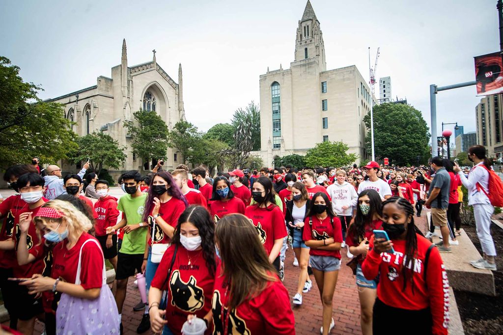 Members of the Boston University Class of 2025 walk down Commonwealth Ave towards the Class of 2025 Matriculation Ceremony at Agganis Arena.