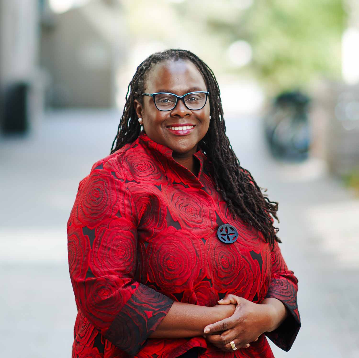 Portrait of Angela Onwuachi-Willig standing outside the Boston University School of Law.