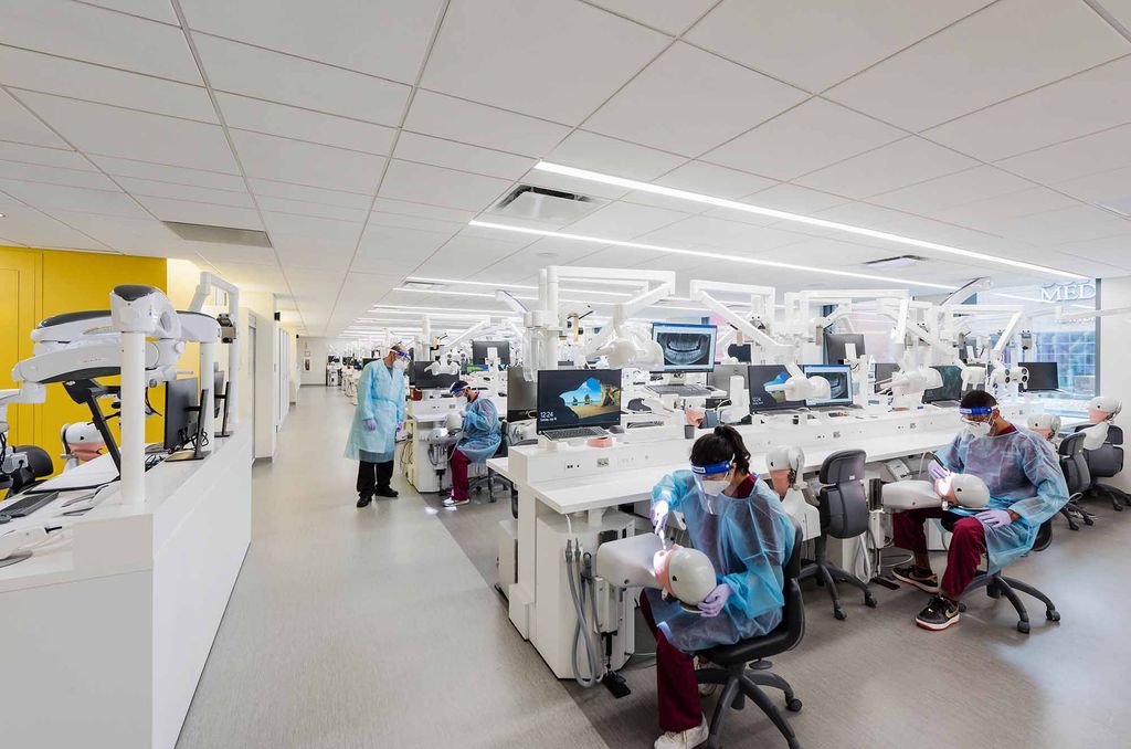 Students work on dummy dental patients at the Boston University Goldman School of Dental Medicine