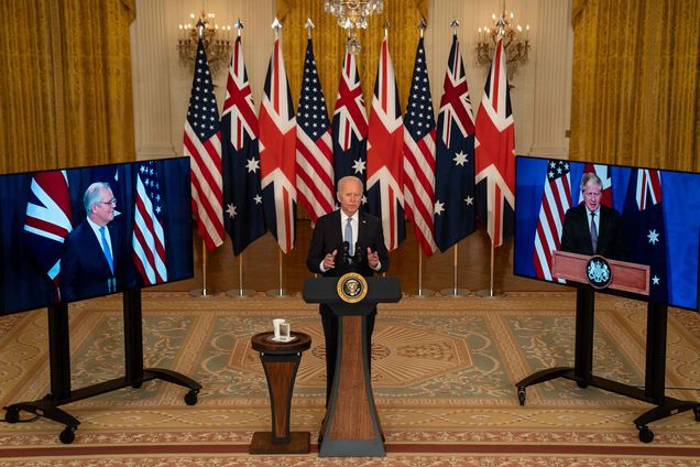 President Joe Biden delivers remarks about a national security initiative to announce that the US will share nuclear submarine technology with Australia from the East Room of the White House Complex as he is joined virtually by Australia Prime Minister Scott Morrison and UK Prime Minister Boris Johnson.