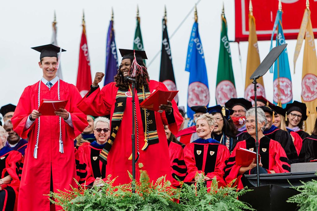 A Class of 2020 graduating student speaks to the crowd on stage during Boston University's 147th Commencement.