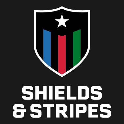 the shields & stripes logo on a black background. A shield outlined in white has blue red and green stripes and "Shields & Stripes" written below it.