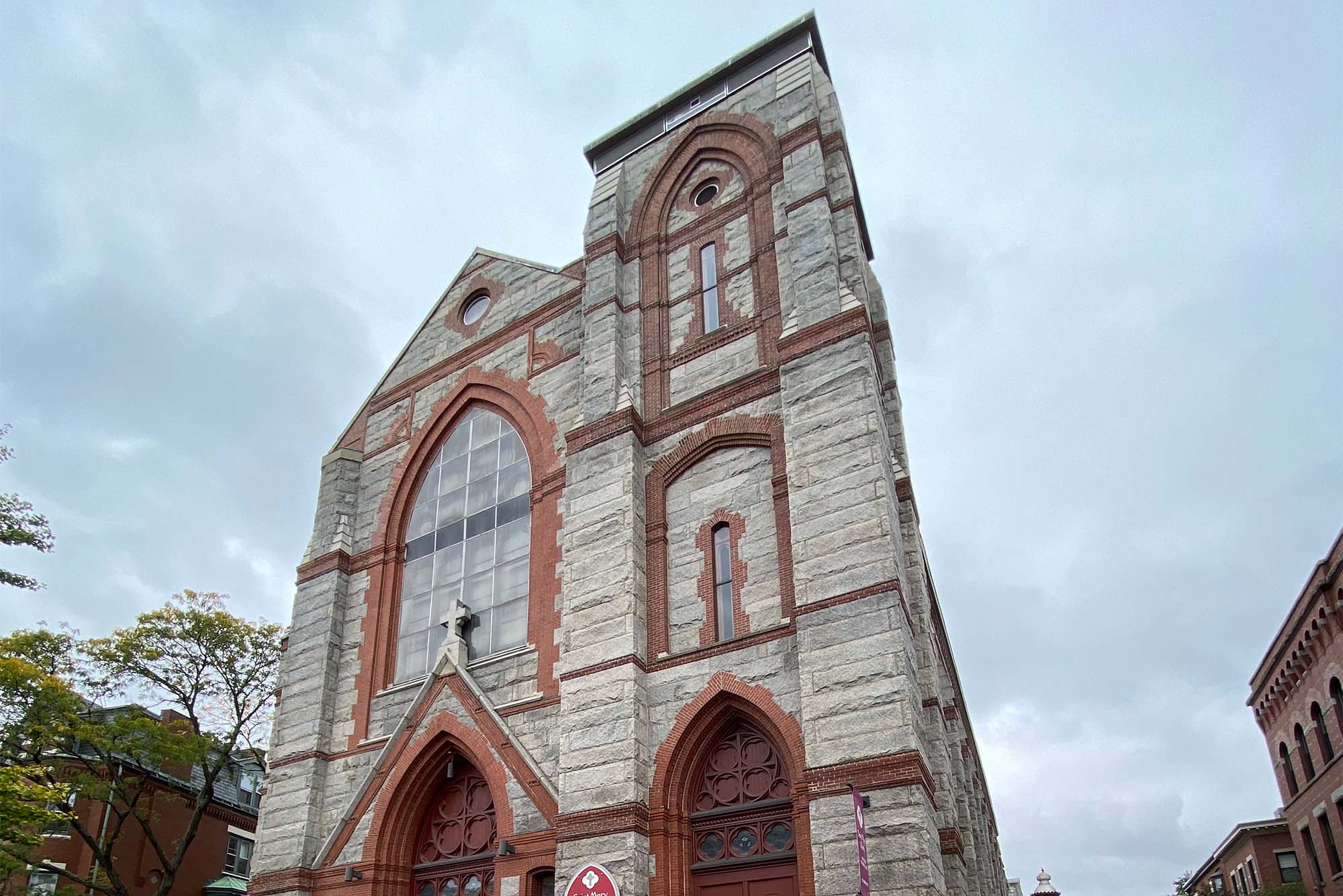 St Mary's church on a cloudy day with ornate wood and stonework