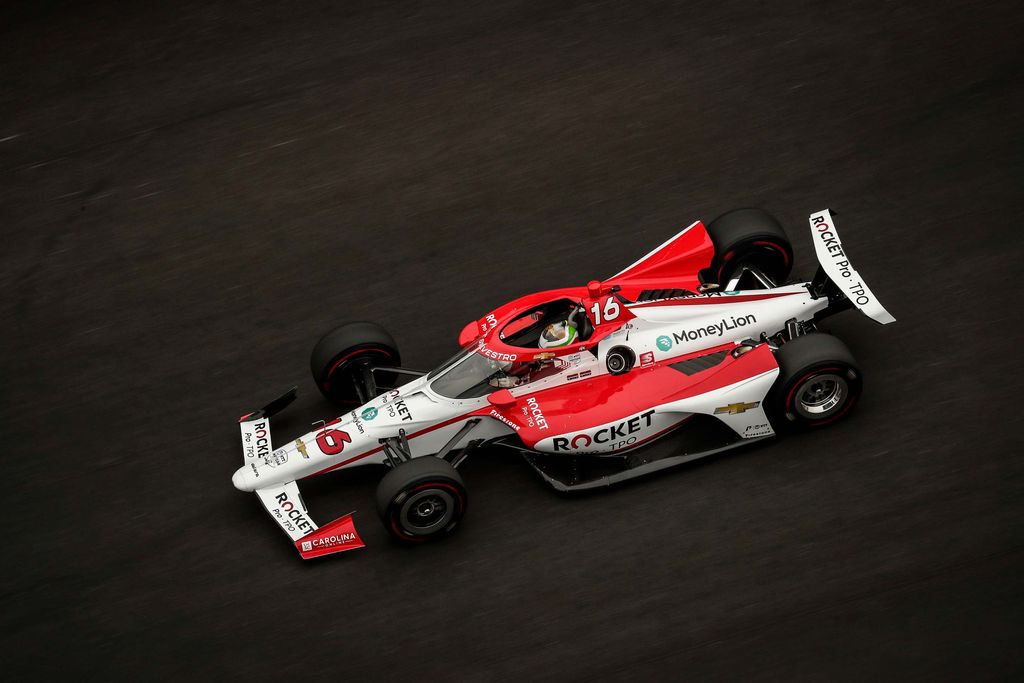 Female IndyCar driver Simona De Silvestro drives the Paretta Autosport Rocket car on track.