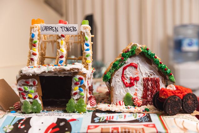 photo of two gingerbread houses with candy accessories