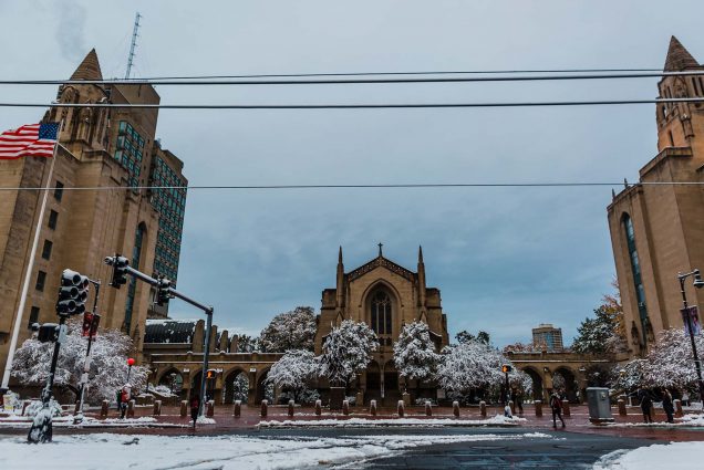 Stock photo of the Center of Boston University campus on a winter day. Snow dusts the campus on a cloudy day.