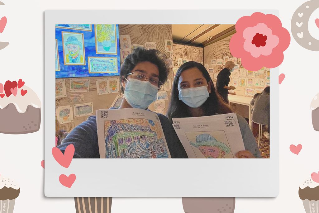 Image: Polaroid style photo of a south asian man and women wearing masks looking forward and smiling to the camera as they hold up Van Gogh style coloring pages. Polaroid is placed on a background of red and pink hearts, cupcakes, flowers, and rainbows.