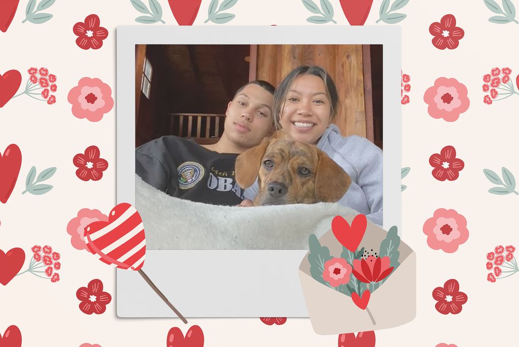 Image: Polaroid style photo of a tan couple and brown dog sitting under a blanket together and looking forward and smiling to the camera. Polaroid is placed on a tan background of red hearts, pink and red flowers, and rainbows. an envelope of tan and red flowers, and a red and white striped heart lollipop